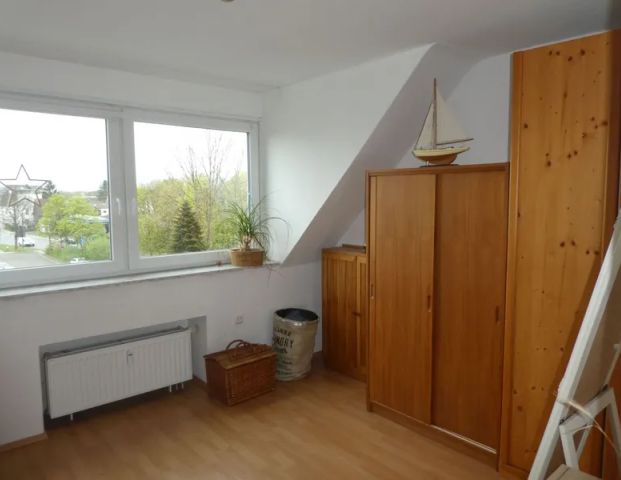 Hübsche 2-Zimmer-Dachgeschoss-Wohnung im Herzen von Asberg - Photo 1