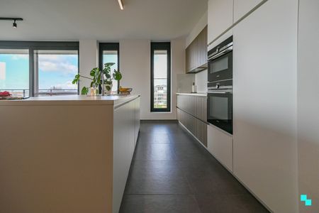 Uniek bijna energieneutraal hoekappartement met ruim terras - Photo 2