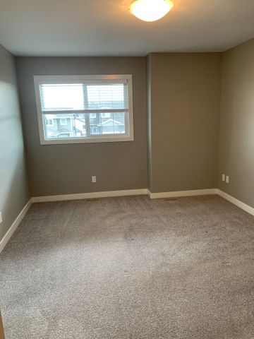 3 Bed Townhouse with Garage in Ryders Ridge - Sylvan Lake - Photo 4