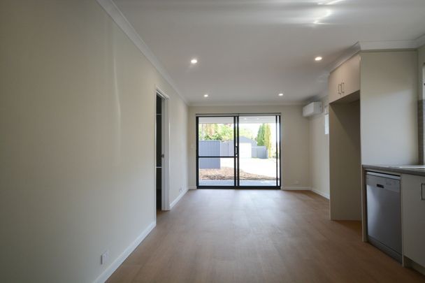 Brand New Three Bedroom Home! - Photo 1