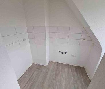 Dachgeschoss-Wohnung in Grevenbroich-Wevelinghoven - Photo 1