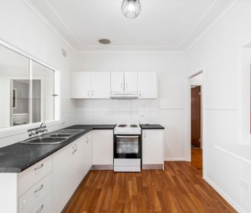 Tidy Two Bedroom Home in Convenient Location - Photo 4