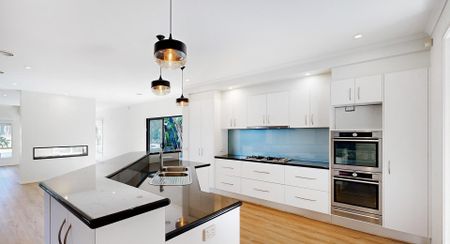 Expansive Family Home with Park Views & Resort-Style Outdoor Living - Photo 2