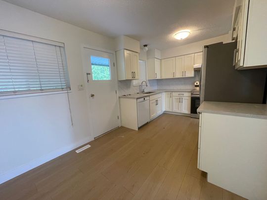 Beautifully Renovated Two-Level Home - Photo 1