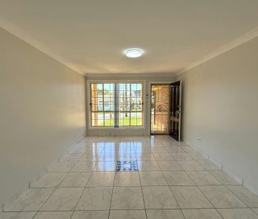 CONTEMPORARY DUPLEX IN HIGHLY DESIRED LOCATION - Photo 2