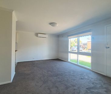 Neat 2 bedroom unit in a Prime Location - Photo 1