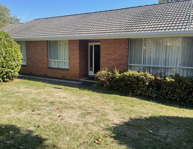 Neat Three Bedroom Home - Photo 1