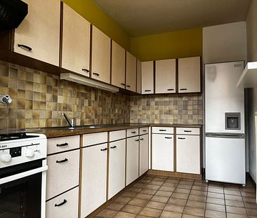 Ruim duplex-appartement met 3 slaapkamers, terras en garage in het centrum van Meerhout. - Foto 2