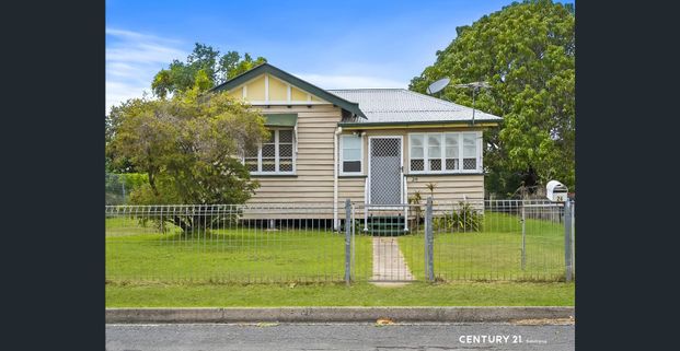 Tidy Cottage with Ample Yard Space - Photo 1