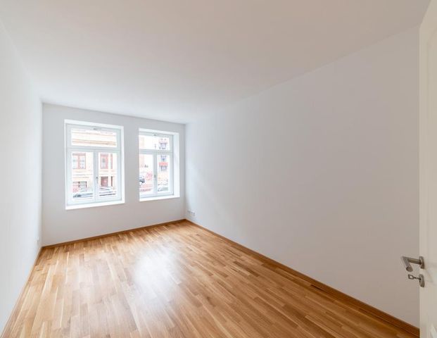 Großzügige Wohnung im Hochparterre mit Balkon - WE01 - Photo 1