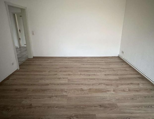 Gepflegte drei Zimmer Wohnung mit Garten zu vermieten! - Foto 1