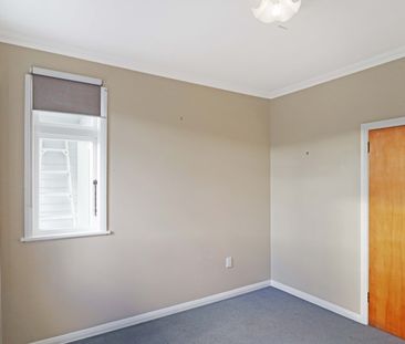 Sunny 3-Bedroom Home with Views in Island Bay - Photo 6