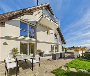 Row single-family house with lake view in best location in Zollikon - Photo 1