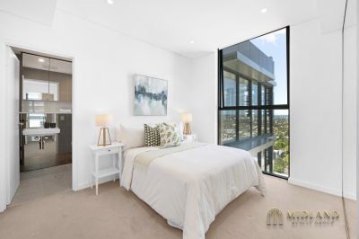 Stunning Two-Bedroom Penthouse with Breathtaking Water Views - Photo 1