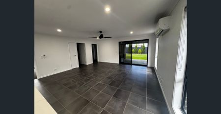 Modern 4-Bedroom Family Home - Photo 4