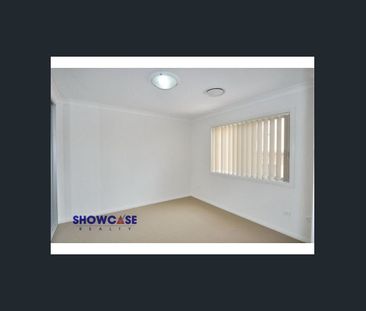 Ultra Convenient Location & Stylish Townhouse! - Photo 4