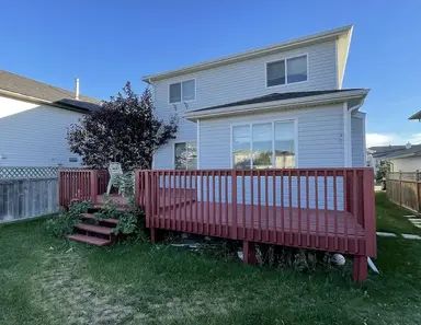 *New Renovation* 3 Bedroom 2.5 Bathroom Double Garage Backing Green Space House | 126 Saratoga Close Northeast, Calgary - Photo 1