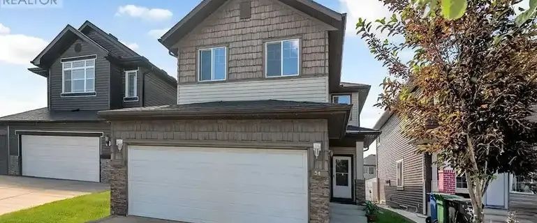 House 4 + Den bedroom & 2.5 bathroom | 34 Saddlecrest Crescent Northeast, Calgary - Photo 1