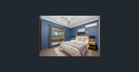 Spacious Family Retreat with Dual Living Areas and Prime Location - Photo 4