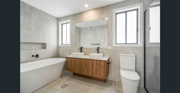 Spacious and Modern Four-Bedroom Home in Spring Farm - Photo 1