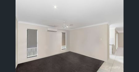 Charming 4-Bedroom Home - Perfect for Family Living in Mount Low - Photo 3