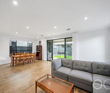 Open the Door to Sun-Soaked Living in a Premium Woodville West Pocket - Photo 2