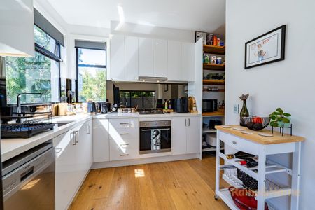 Stunning 2-Bedroom, 2-Bathroom Townhome in a Prime Location - Photo 2