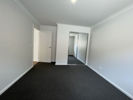 FOUR BEDROOM HOME - LOW MAINTENANCE ! - Photo 5