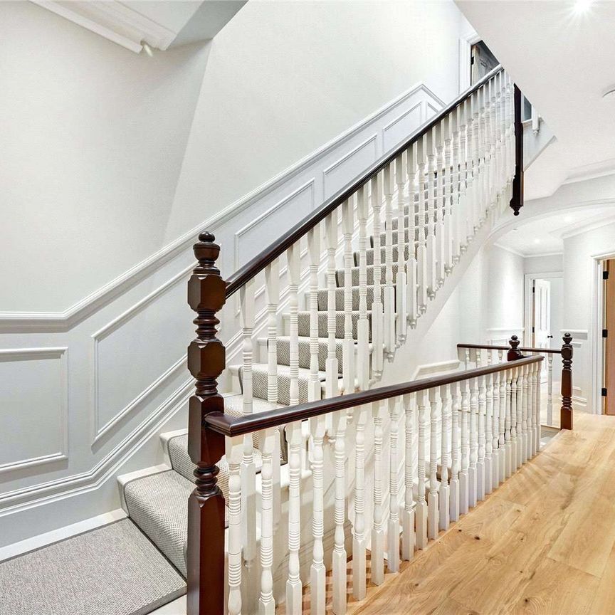 Welcome to this exquisitely refurbished five bedroom semi-detached family home, meticulously designed to an exceptionally high standard. - Photo 1