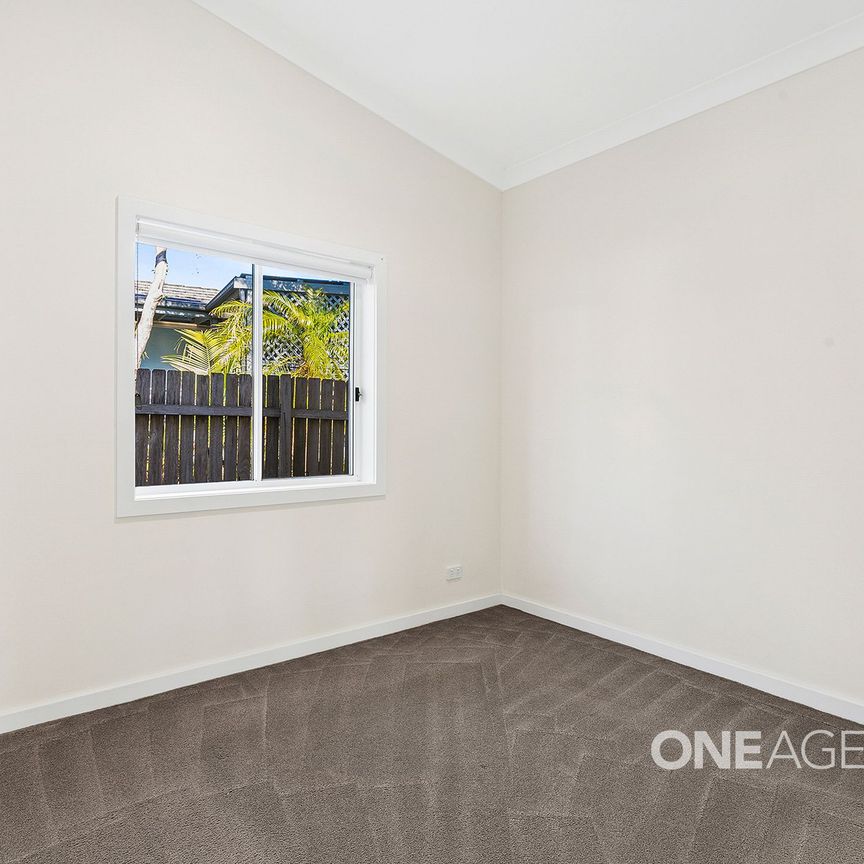 TWO-BEDROOM HOME OFFERING YEAR ROUND COMFORT - Photo 1