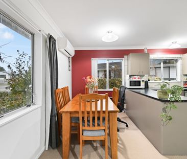 Modern and low-maintenance, this 3-bedroom, 1-bathroom home with a ... - Photo 3