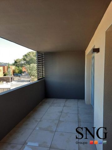 T2 AVEC LOGGIA ET DEUX PARKINGS COUVERTS - Photo 5