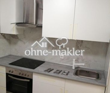 Renovierte Erdgeschosswohnung mit Einbauküche - Photo 4