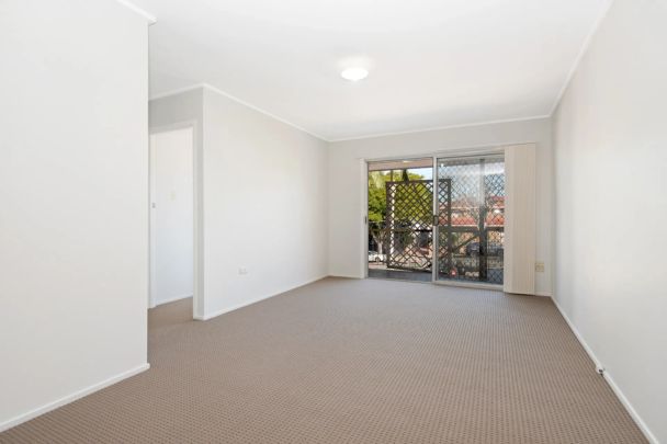 Well-Located Two-Bedroom Apartment with Carport - Photo 1