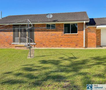 Charming Home with Flexible Living Space and Spacious Backyard - Photo 6