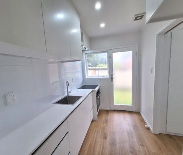 Freshly Renovated brick and tile! - Photo 6