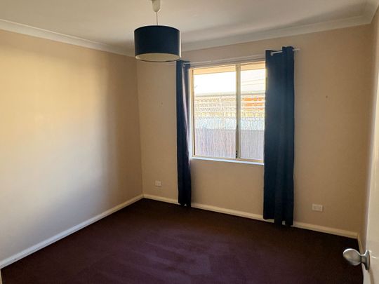 Low maintenance unit in a great location. - Photo 1