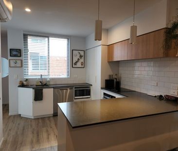 Executive Fully Furnished Two Bedroom Home! - Photo 4