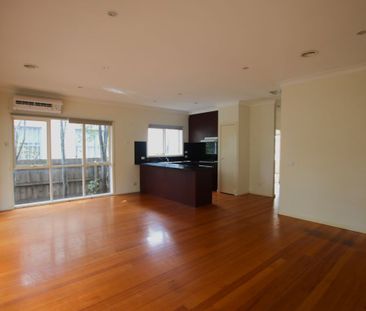 Modern Brick Veneer Home with Courtyard & Driveway Parking - Photo 6