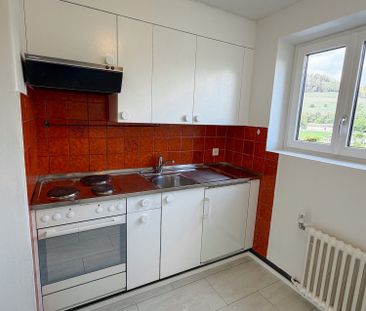 Teilrenovierte 4-Zimmer-Wohnung mit Balkon - Foto 4
