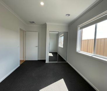 FOUR BEDROOM HOME - LOW MAINTENANCE! - Photo 3