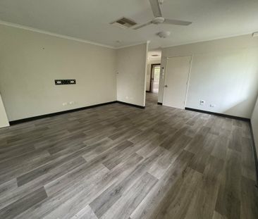 SPACIOUS FOUR BEDROOM, TWO BATHROOM HOUSE WITH 5X CARPORT - Photo 4