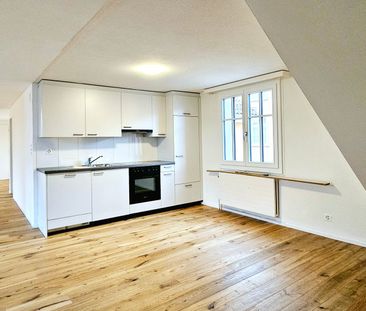 Charmante 2.5-Zimmer-Dachwohnung an zentraler Lage in St. Gallen - Foto 1