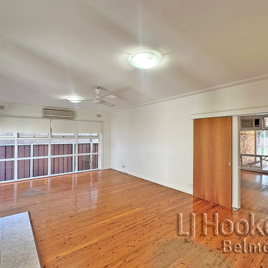 Modern Four Bedroom Home with Huge Backyard! - Photo 1