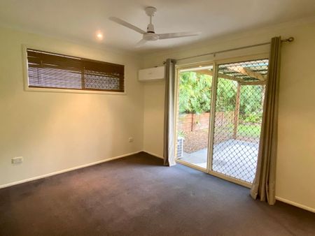 Tropical Retreat Centrally Located - Photo 2
