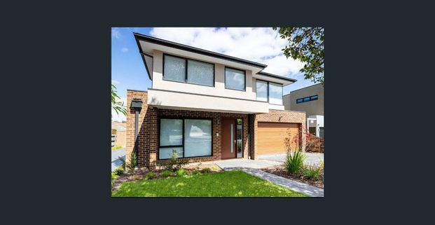 Conveniently Located Modern Townhouse - Photo 1