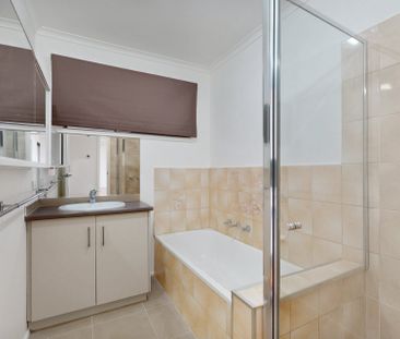Spacious Family Home with Modern Features and Prime Location - Photo 1