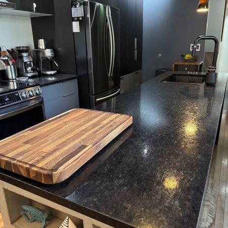 Condo Moderne-Industriel 4 1/2 | Saint-Roch - Photo 4