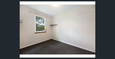 Family-Friendly Living with Decked Outdoor Area & Shed - Photo 2