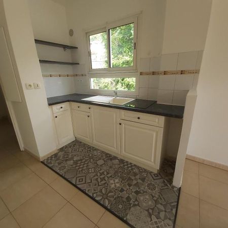 Location Appartement 1 pièce 30m² LA POSSESSION 97419 - Photo 4